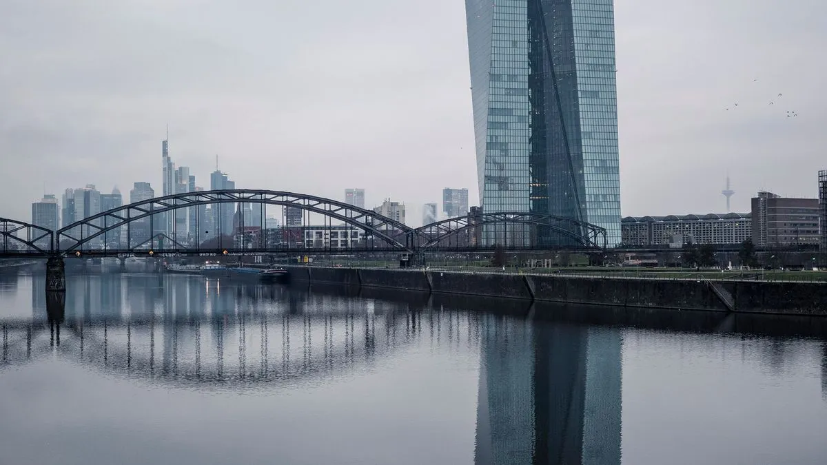 Abgeltungssteuer: How Germany Taxes Investment Income The European Central Bank tower rises beside a steel bridge over the river Main in Frankfurt, the banking skyline hazy in the distance.