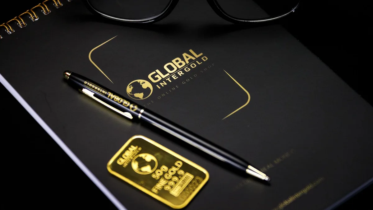 A trading screen showing a gold ETF ticker alongside mining-company shares