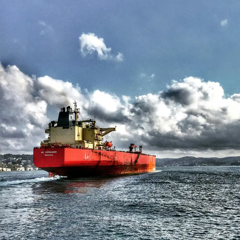 Strait of Hormuz: The World's Most Critical Maritime Chokepoint Oil tanker navigating through the strategic Strait of Hormuz with mountainous coastline in background