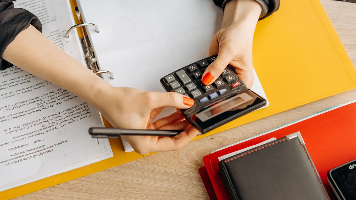 What Is a Good ROI? How to Measure Investment Returns A calculator, working out return on investment by dividing the gain by the original cost